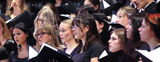 Students singing at a concert.