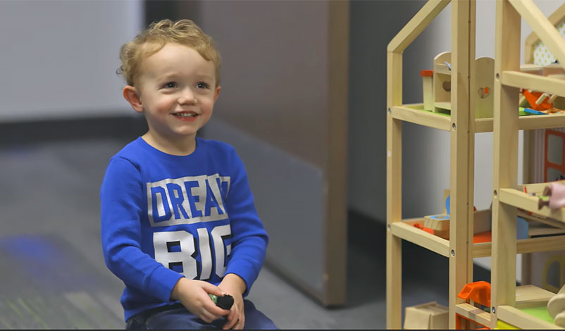 A child receiving play therapy at the Olson Marriage and Family Therapy Clinic