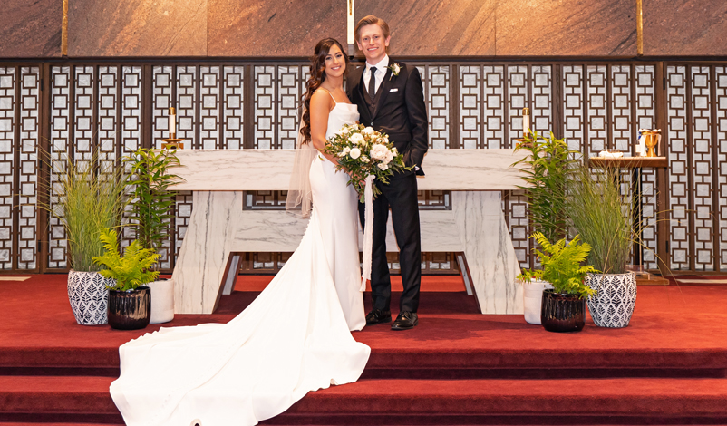 Katie and Michael, posing in the Chapel of Mercy
