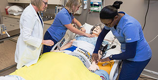 Nursing students practicing a class activity..